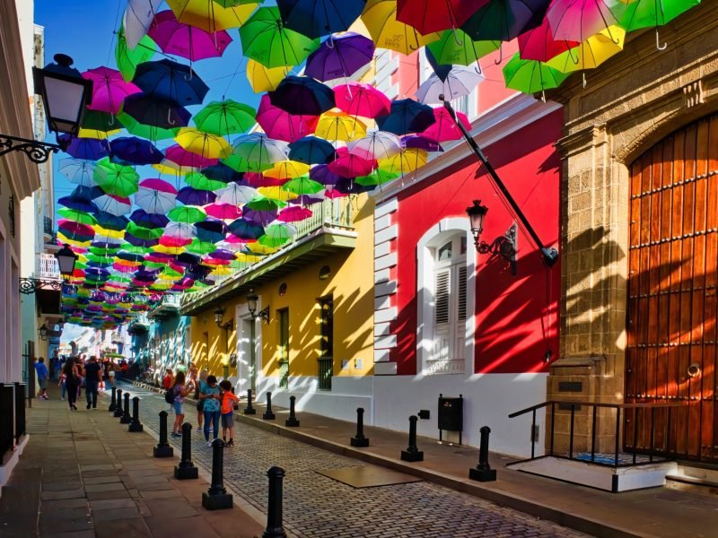 Shoppers stroll through historic Old San Juan. It is the oldest settlement within Puerto Rico and the historic colonial section of the city of San Juan.